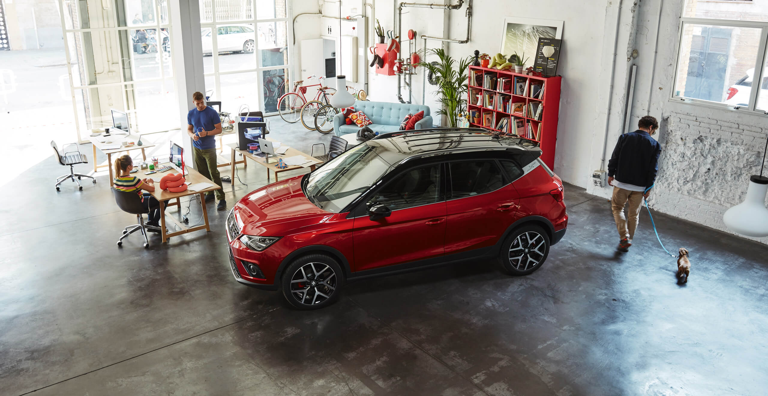SEAT investment Arona angle side view red